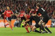 18 November 2008; Mick O'Driscoll, left, and Mark Melbourne, Munster, in action against Stephen Donald and Jason Eaton, right, New Zealand. Zurich Challenge Match, Munster v New Zealand, Thomond Park, Limerick. Picture credit: Brian Lawless / SPORTSFILE