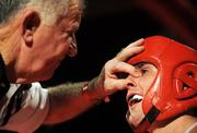 15 November 2008; Eric McDonnell, left stems the blood flow from Andrew McLoughlin's nose. Kildare GAA Fight Night, Time: bar + venue, Naas, Co. Kildare. Picture credit: Ray Lohan / SPORTSFILE  *** Local Caption ***
