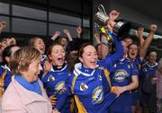 16 November 2008; O'Donovan Rossa (Antrim) captain Jane Adams lifts the Bill Carroll cup as President of the Camogie Association Liz Howard, left, looks on. All-Ireland Senior Camogie Club Final, O'Donovan Rossa (Antrim) v Drom-Inch (Tipperary), Donaghmore Ashbourne, Co. Meath. Photo by Sportsfile