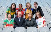 18 November 2008; Declan Moran, Director of Marketing and Business Development, Vhi Healthcare, with Geraldine Giles, Uachtaran Peil Gael na mBan, with players, clockwise from left, Michelle McGing, captain Carnacon, Co. Mayo, Fiona O'Neill, captain Kilmihil, Co. Clare, Lisa Ni Shuibhne, Ballingeary Inchigeela, Co. Cork, Aine Clarke, captain Knockmore, Co. Mayo, Sinead Mohan, captain Emyvale, Co. Monaghan, and Anne Marie Walsh, captain Inch Rovers, Co. Cork, ahead of the 2008 Vhi Healthcare All-Ireland Club Finals. The senior, intermediate and junior finals will take place over the coming two weekends. Croke Park, Dublin. Photo by Sportsfile