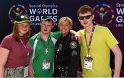 31 July 2015; Team Ireland’s Ian Staunton, a member of Galway Kayaking Special Olympics Club, from Salthill, Galway, with his sister Fiona and his brother Michael and Sgt Diana Hohman, Long Beach Police Department, at the Miami Marine Stadium, Long Beach. Special Olympics World Summer Games, Los Angeles, California, United States. Picture credit: Ray McManus / SPORTSFILE
