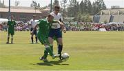 1 August 2015; Team Ireland’s Anthony Clarke, a member of Bray Lakers Special Olympics Club, from Leixlip, Co Kildare, clears under pressure from Paul McAlinden, SO GB during a 'Football 11-a-side' semi final at the Drake Stadium. Ireland were beaten 4-2 and go for a Bonze medal in their next game. Special Olympics World Summer Games, Los Angeles, California, United States. Picture credit: Ray McManus / SPORTSFILE