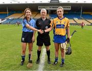 1 August 2015; Referee Cathal Egan looks on as Dublin captain Rachel Noctor and Clare captain Kate Lynch shake hands before the start of the game. Liberty Insurance Senior Camogie Championship Play-Off, Clare v Dublin. Semple Stadium, Thurles, Co. Tipperary. Picture credit: Matt Browne / SPORTSFILE