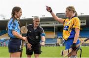 1 August 2015; Clare captain Kate Lynch chooses to play with the wind after winning the coin toss as Dublin captain Rachel Noctor and referee Cathal Egan look on. Liberty Insurance Senior Camogie Championship Play-Off, Clare v Dublin. Semple Stadium, Thurles, Co. Tipperary. Picture credit: Matt Browne / SPORTSFILE