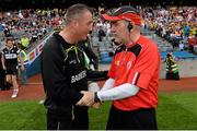 1 August 2015; Sligo manager Niall Carew, left, shakes hands with Tyrone manager Mickey Harte after the game. GAA Football All-Ireland Senior Championship, Round 4B, Sligo v Tyrone. Croke Park, Dublin. Picture credit: Ramsey Cardy / SPORTSFILE