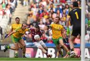 1 August 2015; Danny Cummins, Galway, in action against Neil Gallagher, left, and Neil McGee, Donegal. GAA Football All-Ireland Senior Championship, Round 4B, Donegal v Galway. Croke Park, Dublin. Picture credit: Ramsey Cardy / SPORTSFILE