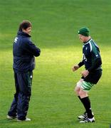 21 November 2008; Ireland's Paul O'Connell does some exercises on his 'dead leg', watched by forwards coach Gert Smal, during the team Captain's Run. Croke Park, Dublin. Picture credit: Brendan Moran / SPORTSFILE