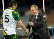 31 October 2008; GAA President Nickey Brennan presents Ireland's Graham Canty with the Player of the Tournament award. Toyota International Rules Series, Australia v Ireland, Melbourne Cricket Ground, Melbourne, Australia. Picture credit: Ray McManus / SPORTSFILE