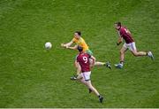 1 August 2015; Martin McElhiney, Donegal, in action against Thomas Flynn, left, and Cathal Sweeney, Galway. GAA Football All-Ireland Senior Championship, Round 4B, Donegal v Galway. Croke Park, Dublin. Picture credit: Dáire Brennan / SPORTSFILE