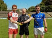 1 August 2015; Team captains Conor Glass, Derry, left, and Conor Berry, Longford, shake hands in the company of referee Liam Devenney. Electric Ireland GAA Football All-Ireland Minor Championship Quarter-Final, Longford v Derry. Brewster Park, Enniskillen, Co. Fermanagh. Picture credit: Oliver McVeigh / SPORTSFILE