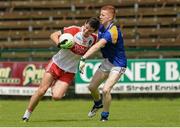 1 August 2015; Shane McGuigan, Derry, in action against  Michael Cahill, Longford. Electric Ireland GAA Football All-Ireland Minor Championship Quarter-Final, Longford v Derry. Brewster Park, Enniskillen, Co. Fermanagh. Picture credit: Oliver McVeigh / SPORTSFILE