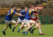 1 August 2015; Conor Glass, Derry, in action against  Longford players, from left, Peter Lynn, Enda Farrell and Ruairi Harkins. Electric Ireland GAA Football All-Ireland Minor Championship Quarter-Final, Longford v Derry. Brewster Park, Enniskillen, Co. Fermanagh. Picture credit: Oliver McVeigh / SPORTSFILE