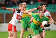 23 November 2008; Paraic Sullivan, Rhode, is tackled by Bryan Carbery, Eire Og. AIB Leinster Senior Club Football Championship Semi-Final, Eire Og v Rhode, Dr. Cullen Park, Carlow. Picture credit: Matt Browne / SPORTSFILE