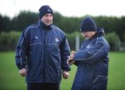 23 November 2008; Cork manager Gerald McCarthy checks the time on his watch in the company of selector Ger Fitzgerald. Match to celebrate 150th Anniversary of St Colman's College, St Colman's XV v Cork Selection XV, Fitzgerald Park, Fermoy, Co. Cork. Picture credit: Brendan Moran / SPORTSFILE