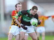 23 November 2008; Niall Geary, Nemo Rangers, in action against Garry Egan, Dromcollogher Broadford. AIB Munster Senior Club Football Championship Semi-Final, Dromcollogher Broadford v Nemo Rangers, Gaelic Grounds, Co. Limerick. Picture credit: Pat Murphy / SPORTSFILE