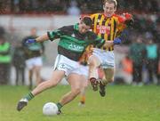 23 November 2008; Brian O'Regan, Nemo Rangers, in action against Michael Reidy, Dromcollogher Broadford. AIB Munster Senior Club Football Championship Semi-Final, Dromcollogher Broadford v Nemo Rangers, Gaelic Grounds, Co. Limerick. Picture credit: Pat Murphy / SPORTSFILE