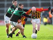 23 November 2008; Sean Buckley, Dromcollogher Broadford, in action against Paul Brophy and Brian O'Regan, back, Nemo Rangers. AIB Munster Senior Club Football Championship Semi-Final, Dromcollogher Broadford v Nemo Rangers, Gaelic Grounds, Co. Limerick. Picture credit: Pat Murphy / SPORTSFILE