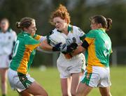 23 November 2008; Eve Wardick, Meath, in action against Roisin Friel and Aoife Hegarty, Donegal. TG4 Senior Championship Relegation Play-Off, Donegal v Meath, Templeport, Co. Cavan. Picture credit: Oliver McVeigh / SPORTSFILE
