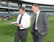 24 October 2008; Steven McDonnel, Armagh, and Benny Coulter, Down, read the match programme ahead of the game. 2008 Toyota International Rules Series, Australia v Ireland, Subiaco Oval, Perth, Western Australia. Picture credit: Ray McManus / SPORTSFILE