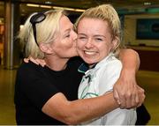 3 August 2015; Ireland's Molly Scott, age 16, St. Laurence O'Toole A.C., Carlow, who competed in the 100-meter hurdles, is welcomed home by her mother Deirdre at the Irish team's return from the European Youth Olympics. Dublin Airport, Dublin. Picture credit: Cody Glenn / SPORTSFILE