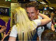 3 August 2015; Ireland's Ryan Carthy Walsh, age 16, Adamstown A.C., Wexford, is welcomed home by friends and family after winning a silver in the high jump, at the Irish team's return from the European Youth Olympics. Dublin Airport, Dublin. Picture credit: Cody Glenn / SPORTSFILE