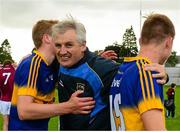 3 August 2015; Tipperary manager Charlie McGeever celebrates with Brian McGrath, left, and Brendan Martin after the game. Electric Ireland GAA Football All-Ireland Minor Championship, Quarter-Final, Galway v Tipperary. O'Connor Park, Tullamore, Co. Offaly. Picture credit: Piaras Ó Mídheach / SPORTSFILE