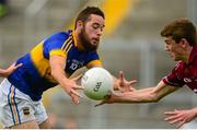 3 August 2015; Aidan Buckley, Tipperary, in action against John Daly, Galway. Electric Ireland GAA Football All-Ireland Minor Championship, Quarter-Final, Galway v Tipperary. O'Connor Park, Tullamore, Co. Offaly. Picture credit: Piaras Ó Mídheach / SPORTSFILE