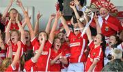 3 August 2015; Cork captain Eimear Scally lifts the trophy following their side's victory. TG4 Ladies Football All-Ireland Minor A Championship Final, Cork v Galway. Semple Stadium, Thurles, Co. Tipperary. Picture credit: Ramsey Cardy / SPORTSFILE