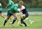 4 August 2015; Ireland's Ian Madigan in action against Noel Reid during squad training. Ireland Rugby Squad Training. Carton House, Maynooth, Co. Kildare. Picture credit: Matt Browne / SPORTSFILE