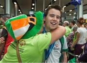 4 August 2015; Team Ireland’s Colm Monahan, a member of Ballincollig Special Olympics Club, from Ballincollig, Co Cork, is greeted by Fidelma Coleman at Dublin Airport during their homecoming. Team Ireland returns from the Special Olympics World Summer Games. Terminal 2, Dublin Airport. Picture credit: Ray McManus / SPORTSFILE