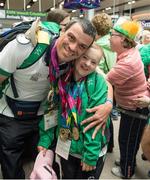 4 August 2015; Team Ireland’s Dearbhail Savage, a member of the Saddle and Reins Special Olympics Club, from Mowhan, Co Armagh with Thomas Connolly, a member of the Nightriders Special Olympics Riding Club, from Coolaney, Co Sligo, at Dublin Airport during their homecoming. Team Ireland returns from the Special Olympics World Summer Games. Terminal 2, Dublin Airport. Picture credit: Ray McManus / SPORTSFILE