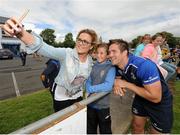 4 August 2015; Leinster's Colm O'Shea has a 'selfie' taken with supporters following squad training. Leinster Rugby Squad Training. Edenderry, Co. Offaly. Picture credit: Seb Daly / SPORTSFILE