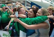 4 August 2015; Team Ireland’s Paul Keane, a member of Wexford Special Olympics Club, from Ferns, Co Wexford, is welcomed home by his sister, Niamh, right, and a family friend Liz McCarthy. Team Ireland returns from the Special Olympics World Summer Games. Terminal 2, Dublin Airport. Picture credit: Ray McManus / SPORTSFILE