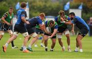 4 August 2015; Leinster's Ed Byrne, centre, in action during squad training. Leinster Rugby Squad Training. Edenderry, Co. Offaly. Picture credit: Seb Daly / SPORTSFILE