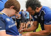 4 August 2015; Leinster's Isa Nacewa singing an autograph after squad training. Leinster Rugby Squad Training. Edenderry, Co. Offaly. Picture credit: Eoin Noonan / SPORTSFILE