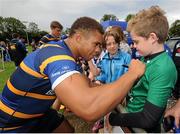 4 August 2015; Leinster's Adam Byrne signs autographs for a supporter following squad training. Leinster Rugby Squad Training. Edenderry, Co. Offaly. Picture credit: Seb Daly / SPORTSFILE