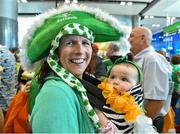 4 August 2015; Cliodhna Hughes and her daughter Eimear, age 7-months, of Ardmore, Co. Dublin, arrived early to greet the Special Olympians at Dublin Airport during their homecoming. Team Ireland returns from the Special Olympics World Summer Games. Terminal 2, Dublin Airport. Picture credit: Cody Glenn / SPORTSFILE