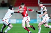 28 November 2008; Rhys Priestland, Scarlets, in action against Denis Leamy, left, and Mick O'Driscoll, Munster. Magners League, Scarlets v Munster, Llanelli, Wales. Picture credit: Steve Pope / SPORTSFILE