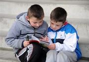 29 November 2008; Noel Fitzsimons, left, aged nine, and his brother Dylan, aged seven, from Blackrock, Co. Dublin, study the form at Fairyhouse. Fairyhouse Winter Festival 2008. Fairyhouse Racecourse, Co. Meath. Photo by Sportsfile