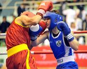 29 November 2008; Katie Taylor, ireland, in action against Cheng Dong, China, during their 60kg bout. AIBA Women's World Boxing Championships - Final. Ningbo City, China. Picture credit: SPORTSFILE / Courtesy of AIBA