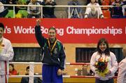 29 November 2008; Ireland's Katie Taylor celebrates retaining her World lightweight title after victory over China's Cheng Dong in their 60kg final. AIBA Women's World Boxing Championships - Final. Ningbo City, China. Picture credit: SPORTSFILE / Courtesy of AIBA