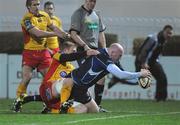 29 November 2008; Leinster's Bernard Jackman goes over for the second try despite the tackle of Newport Gwent Dragons' Jamie Ringer. Magners League, Leinster v Newport Gwent Dragons, RDS, Dublin. Picture credit: Maurice Doyle  / SPORTSFILE