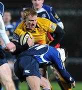29 November 2008; Jamie Ringer, Newport Gwent Dragons, is tackled by David Holwell, Leinster. Magners League, Leinster v Newport Gwent Dragons, RDS, Dublin. Picture credit: Matt Browne / SPORTSFILE