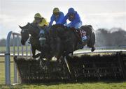 30 November 2008; Hurricane Fly, with Paul Townend up, right, clears the last ahead of second Donnas Palm, Barry Geraghty up, centre, and third Cousin Vinny, Pat Mullins up, during the Bar One Racing Royal Bond Novice Hurdle of €90,000. Fairyhouse Winter Festival 2008, Fairyhouse Racecourse, Co. Meath. Picture credit: Brian Lawless / SPORTSFILE