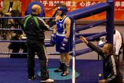 28 November 2008; Ireland's Katie Taylor, with her father and coach Pete, left, before her victory over Russia's Ayzznat Gadzhieva in their 60kg Semi-Final bout. AIBA Women’s World Boxing Championships, Ningbo City, China. Picture credit: SPORTSFILE / Courtesy of AIBA