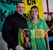 29 November 2008; VHI Healthcare Account Manager Mark Gilmore with Kilmihil captain Fiona O'Neill after the match. VHI Healthcare All-Ireland Ladies Junior Club Football Championship Final, Kilmihil, Clare, v Knockmore, Mayo. Tuam Stadium, Tuam, Co. Galway. Picture credit: Ray Ryan / SPORTSFILE