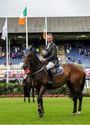 5 August 2015; Dermott Lennon, Ireland, on Loughview Lou-Lou, after winning the Irish Sports Council Classic during the Discover Ireland Dublin Horse Show 2015. RDS, Ballsbridge, Dublin. Picture credit: Seb Daly / SPORTSFILE