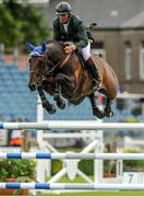 5 August 2015; Edward Doyle, Ireland, on Mullaghdrin Touch The Stars, competes in the Irish Sports Council Classic during the Discover Ireland Dublin Horse Show 2015. RDS, Ballsbridge, Dublin. Picture credit: Seb Daly / SPORTSFILE
