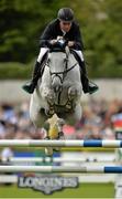 6 August 2015; Cian O'Connor, Ireland, competing on Coco II on their way to a third-place finish in the Serpentine Speed Stakes sponsored by CityJet during the Discover Ireland Dublin Horse Show 2015. RDS, Ballsbridge, Dublin. Picture credit: Cody Glenn / SPORTSFILE