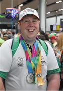 4 August 2015; Team Ireland’s Sean Campbell, a member of Causeway Coast Special Olympics Club, from Coleraine, Co. Derry, at Dublin Airport during their homecoming. Team Ireland returns from the Special Olympics World Summer Games. Terminal 1, Dublin Airport. Picture credit: Ray McManus / SPORTSFILE